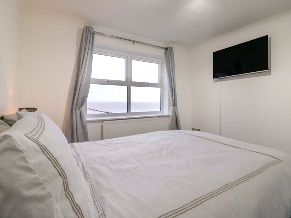 A bedroom with a bed and television at 79 Selsey Avenue