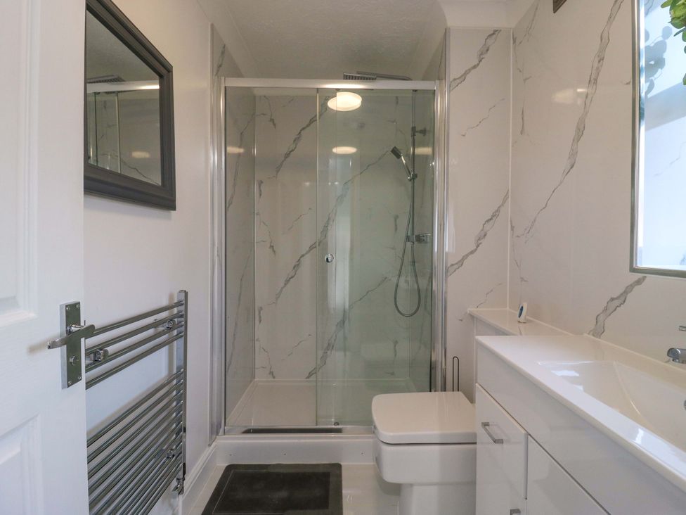 A bathroom with a shower and toilet at 79 Selsey Avenue