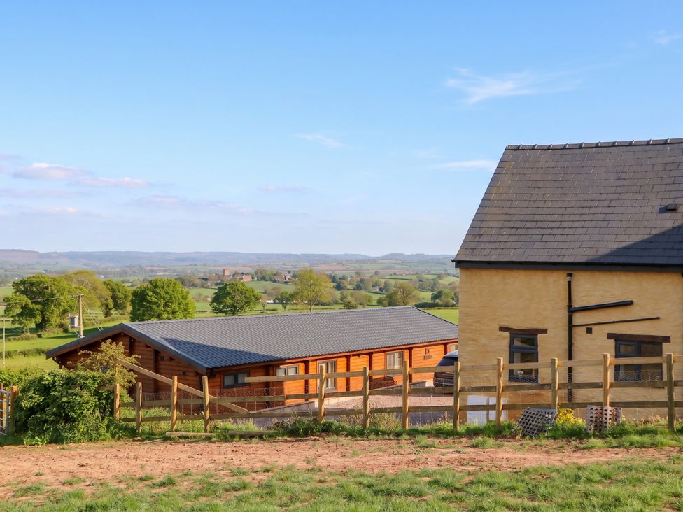 A house and cabin with a view of the countryside at Palace Studio St Weonards