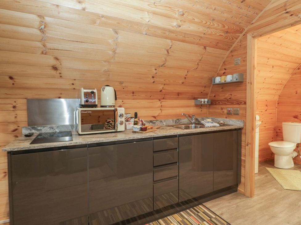 A kitchen with sink and appliances at Oak in Ulverston