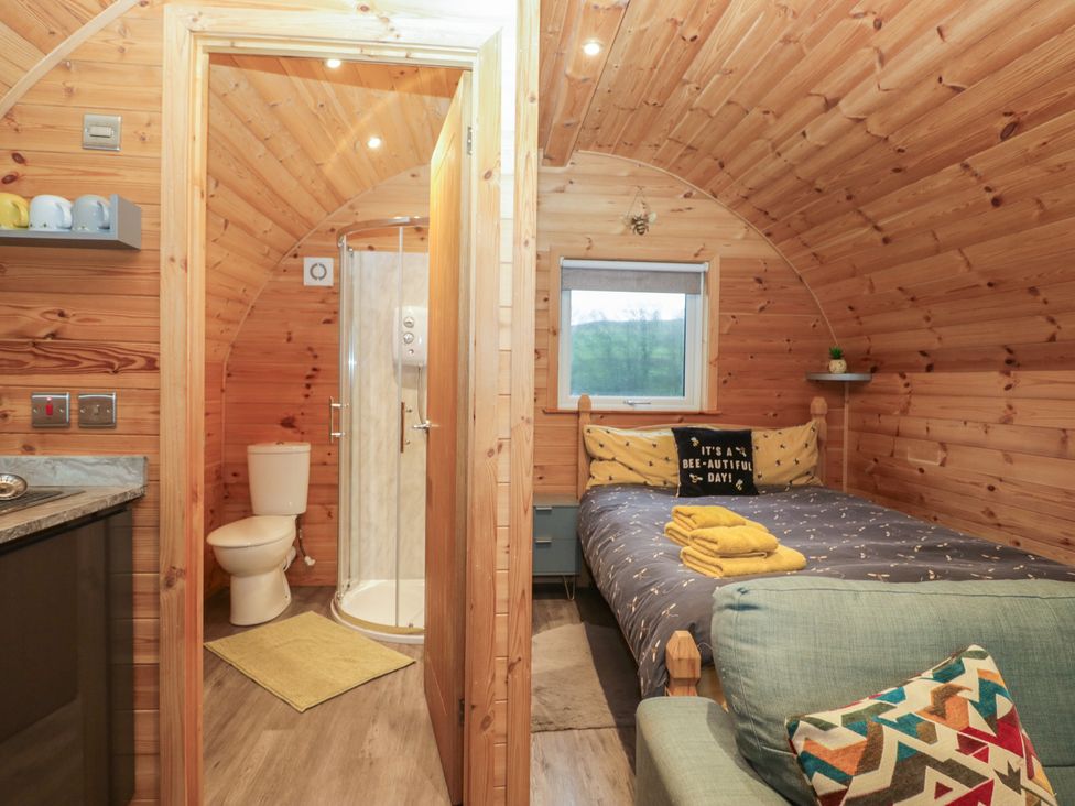 A bedroom with a shower and toilet at Oak in Ulverston