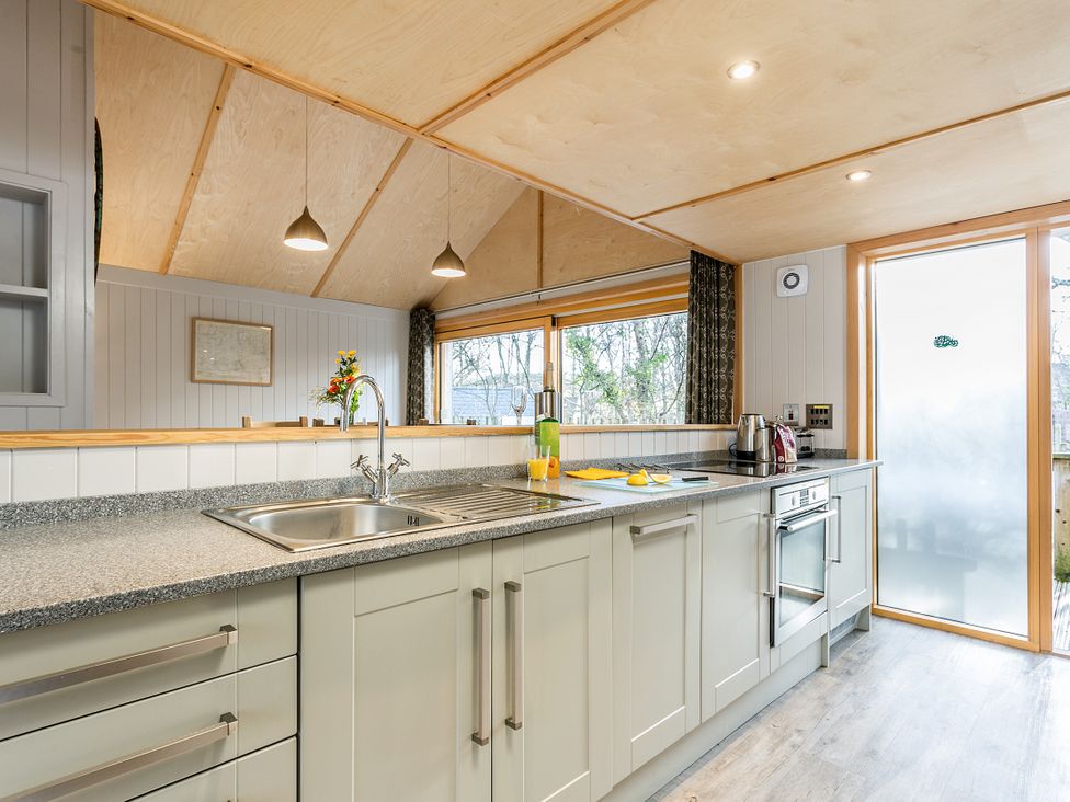 A kitchen with a sink and counter at Lodge 16 in Corfe Castle