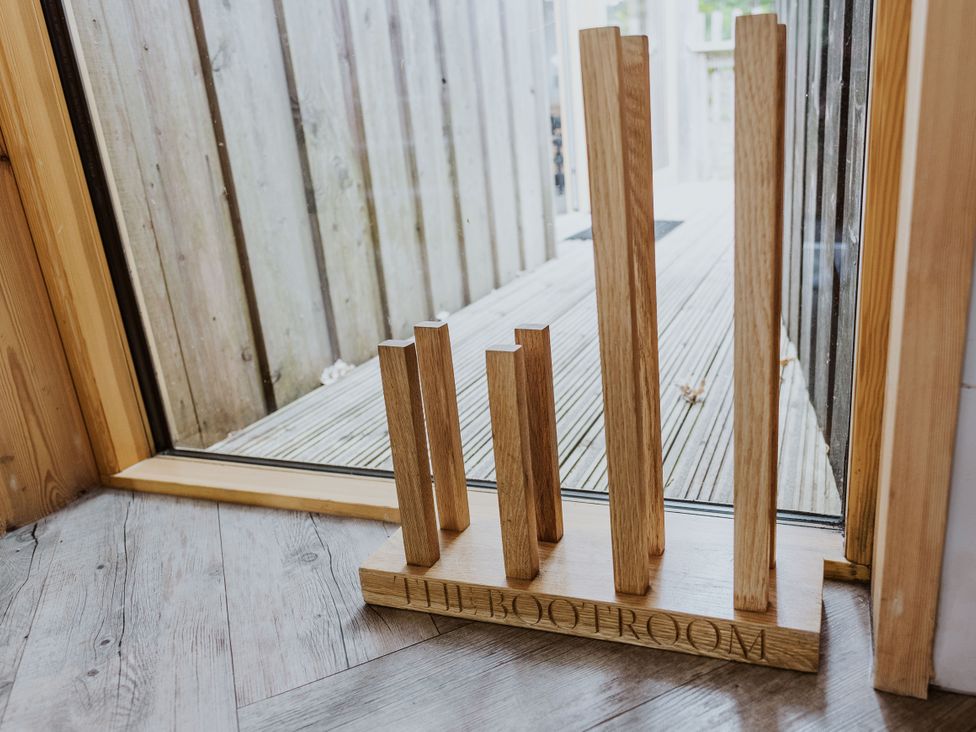 A boot rack by the door at Lodge 19 in Corfe Castle