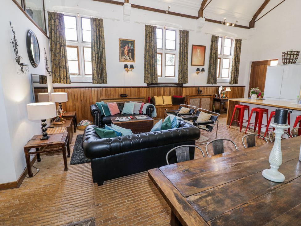 A living room with a sofa and coffee table at Talbot Lodge Ingestre near Great Haywood