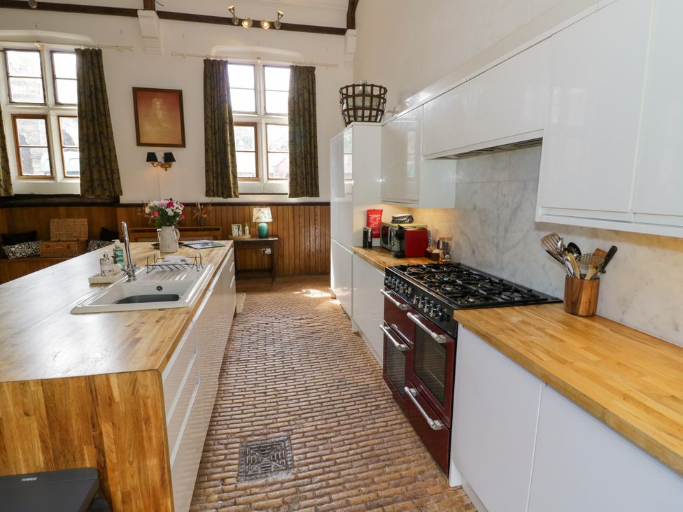 A kitchen with countertops and a stove at Talbot Lodge Ingestre near Great Haywood