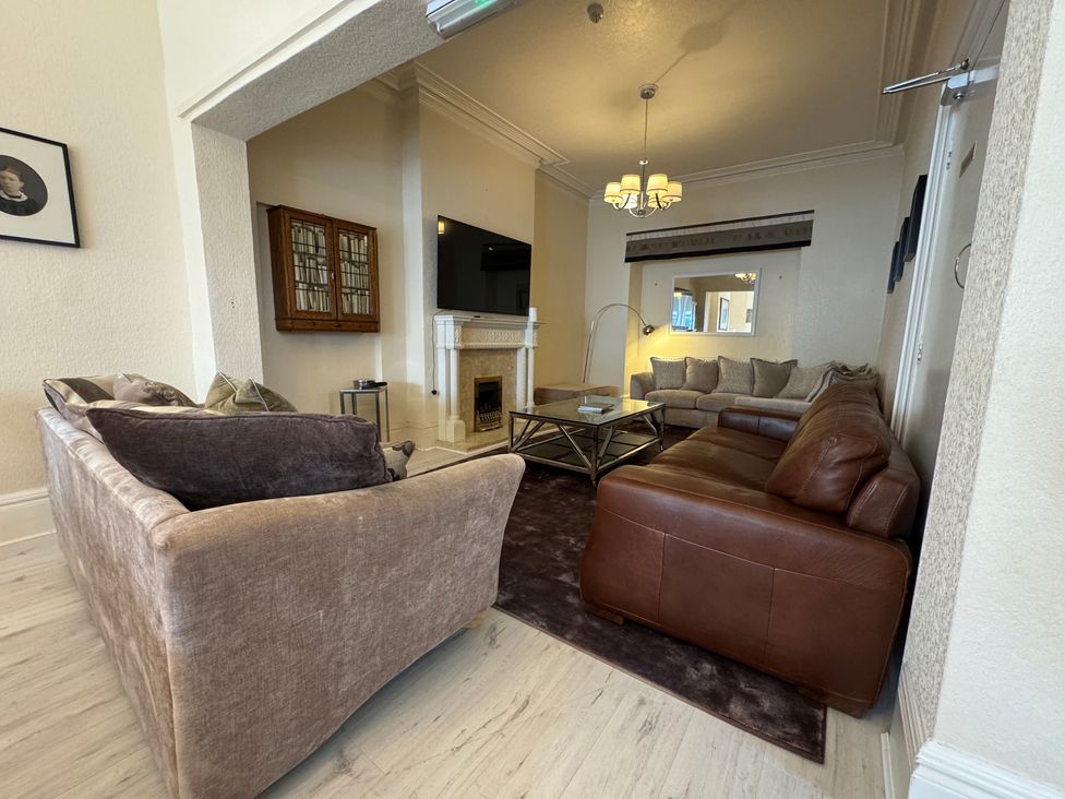 A living room with a sofa and coffee table at The Causeway