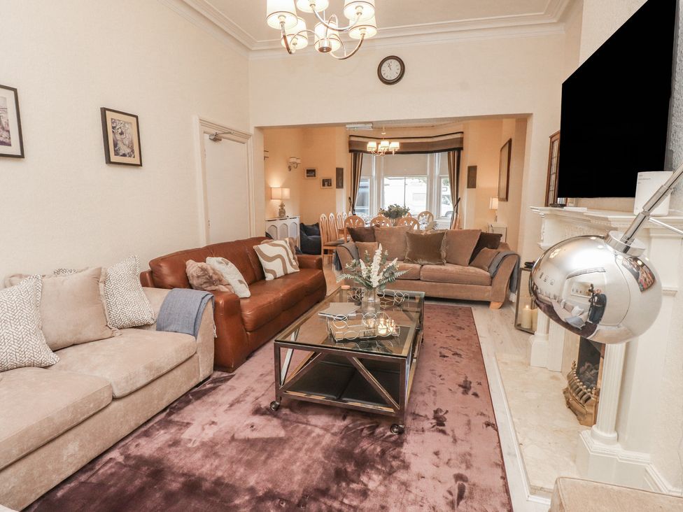 A living room with two sofas and a coffee table at The Causeway in Llandudno