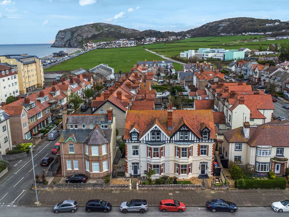 An aerial view of residential buildings and landscape at The Causeway, Llandudno