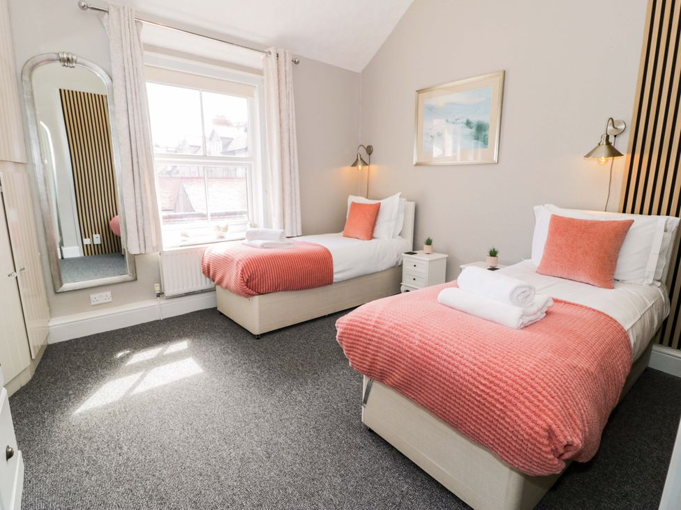 A bedroom with two beds at The Causeway in Llandudno