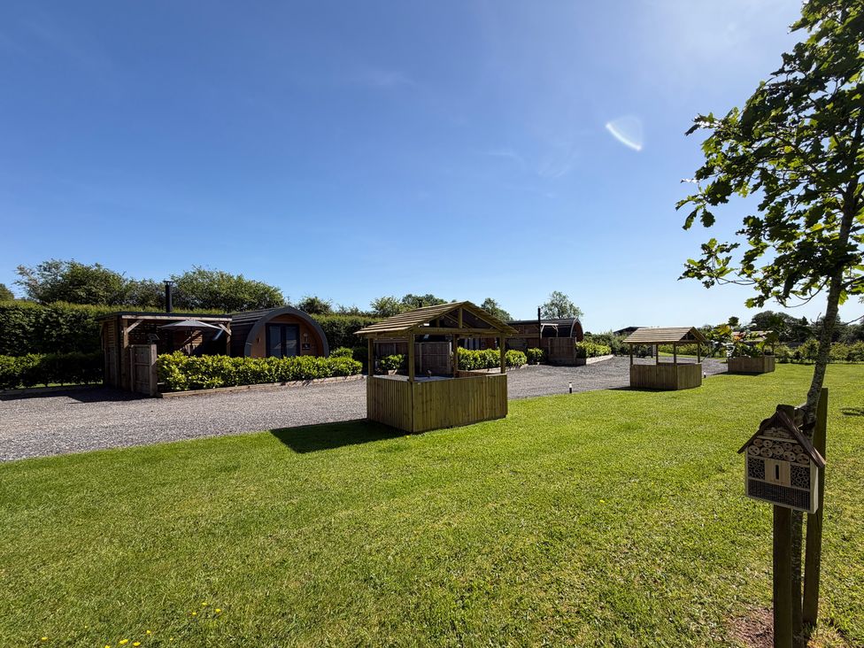 An outdoor area with cabins and gazebos at Oh Deer Ashbourne