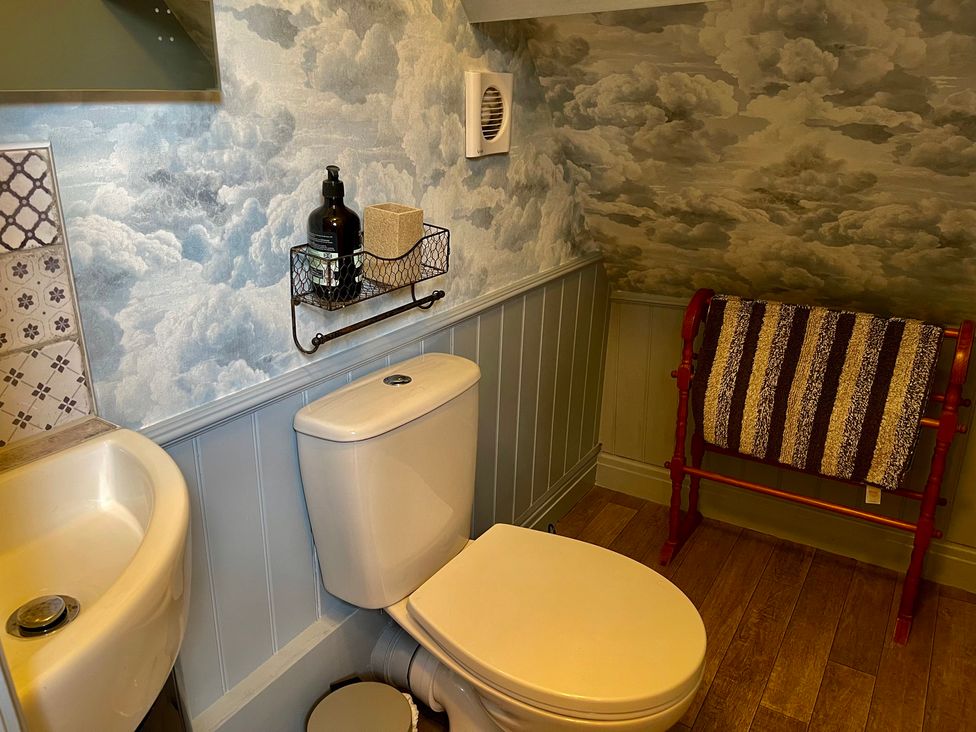 A bathroom with a sink and toilet at The Ticket Office in Ruswarp near Whitby