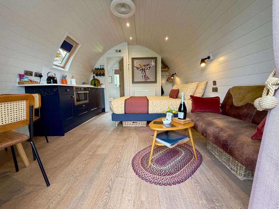 A studio with a kitchen and a bed at No Deer in Ashbourne