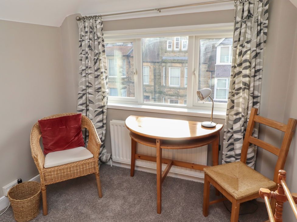 An office with a desk and chair at Rose House in Alnmouth