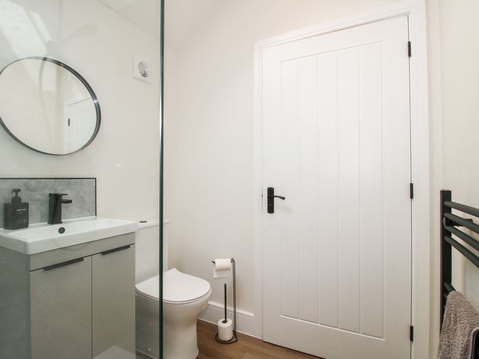 A bathroom with a sink and toilet at Oak Barn Northwood near Wem