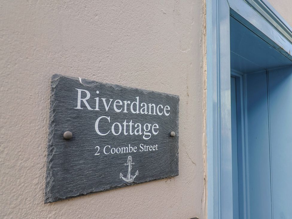 A plaque with Riverdance Cottage name at Riverdance Cottage in Lyme Regis
