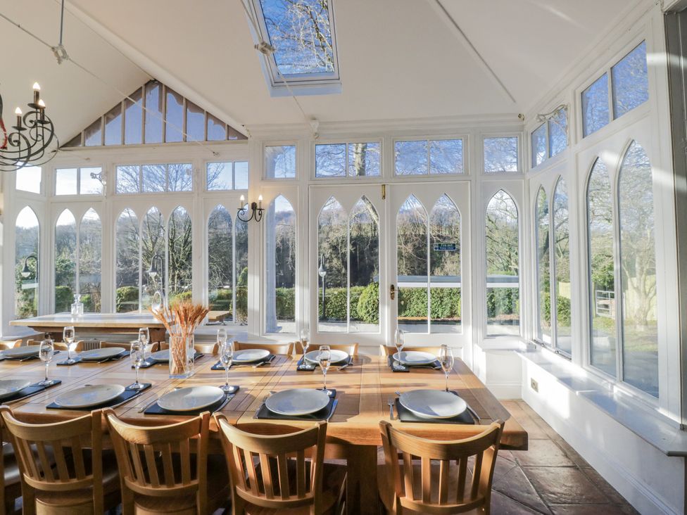 A dining room with a table and chairs at Valley View in Dalton-In-Furness