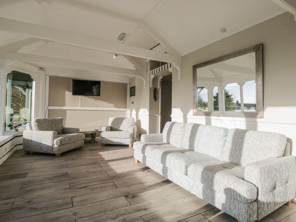 A living room with a sofa and armchairs at Valley View in Dalton-In-Furness