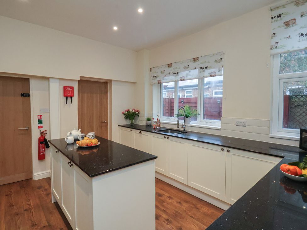 A kitchen with countertop and sink at Bridlington Bay House in Bridlington