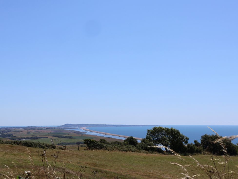 A view of the sea and land from a higher elevation at The Hideaway in Portesham