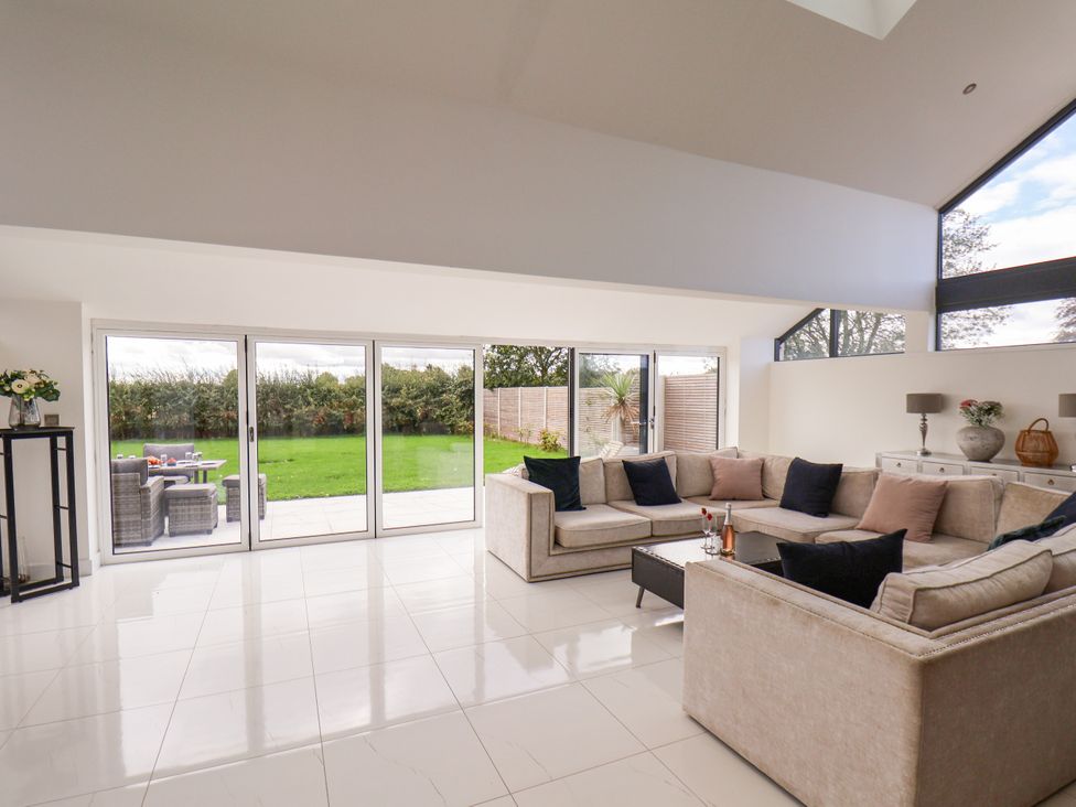 A living room with a sofa and coffee table at Meadow View Beverley near Walkington