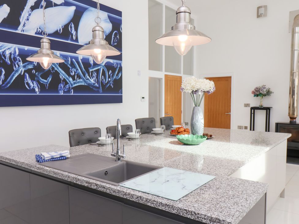 A kitchen with a large island and sink at Meadow View Beverley near Walkington