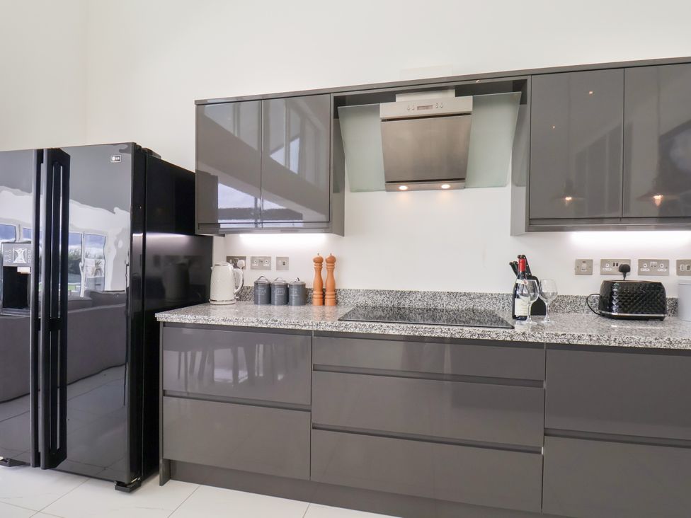 A kitchen with a refrigerator and countertop appliances at Meadow View in Beverley near Walkington