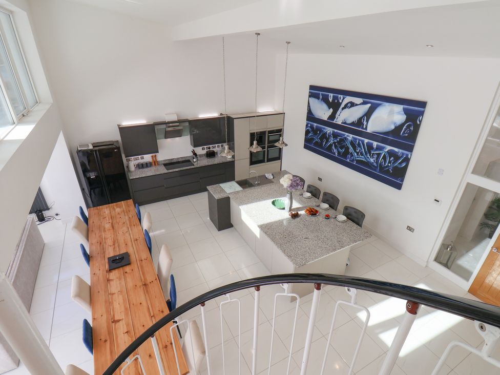 A kitchen with a dining table and seating at Meadow View in Beverley near Walkington