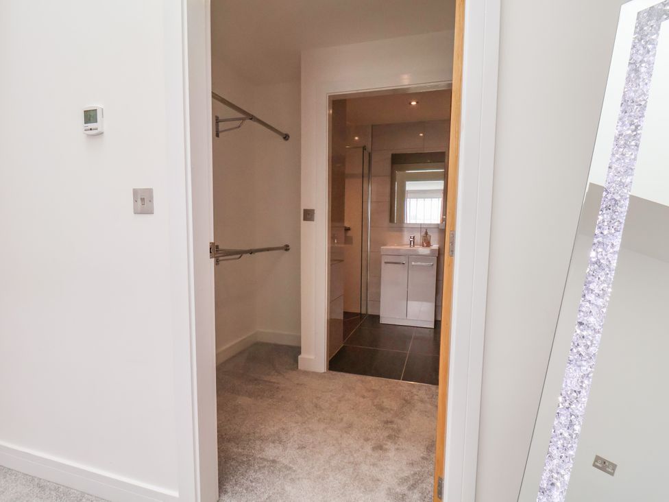 A bathroom with a sink and mirror at Meadow View Beverley near Walkington