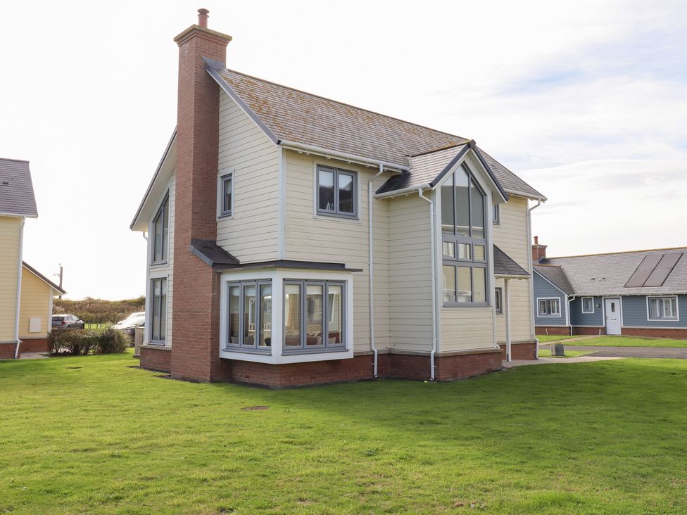 A house with windows and a chimney at The Beach House (Beadnell) Beadnell