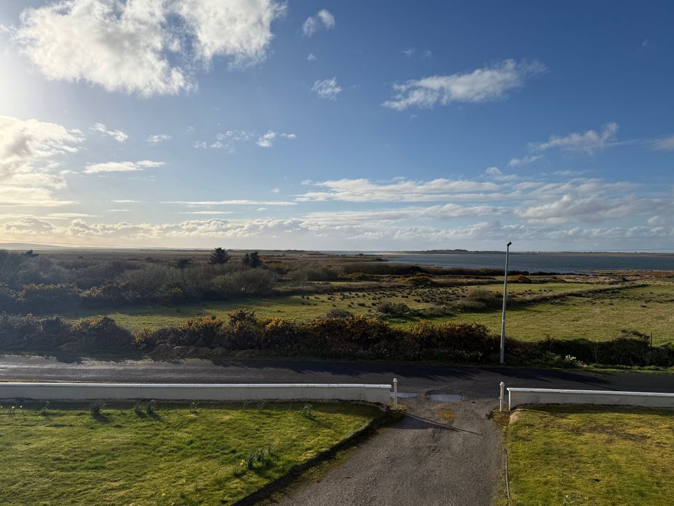 A view of water and land from a distance at Geesala