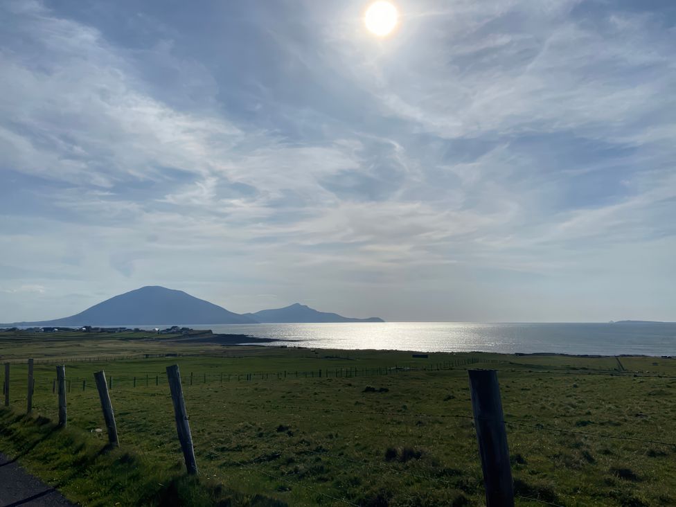 A landscape with mountains and ocean at Geesala in Gweesalia