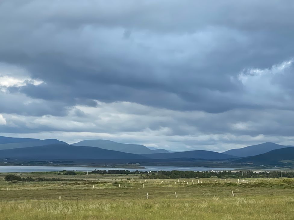 A landscape view featuring mountains and clouds at Geesala in Gweesalia