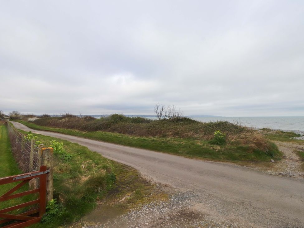 A road alongside the ocean at Belan Wen in Llanddona near Pentraeth