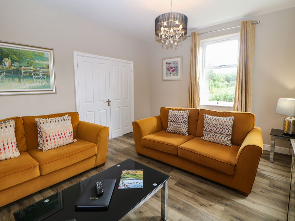 A living room with two sofas and a coffee table at Hardwick in Darley Moor near Two Dales