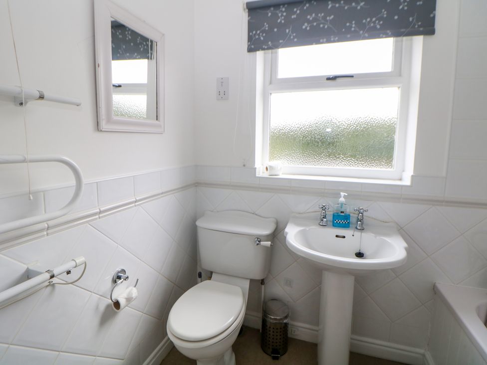 A bathroom with a sink and toilet at Hardwick in Darley Moor near Two Dales