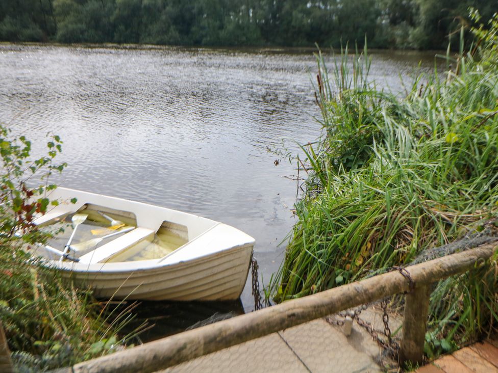A boat at the water's edge at Hardwick Darley Moor near Two Dales