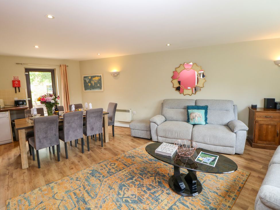 A living room with a dining area and kitchenette at Hartington Darley Moor near Two Dales
