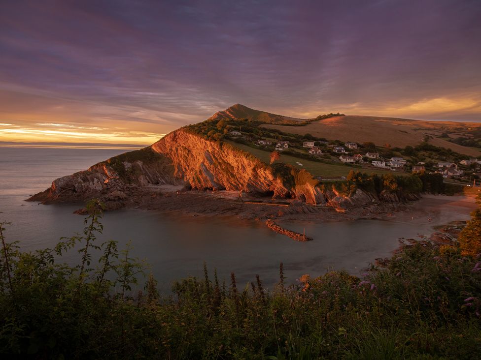 A coastal view with hills and houses at Larchwood Lodge @ Manleigh Park Combe Martin