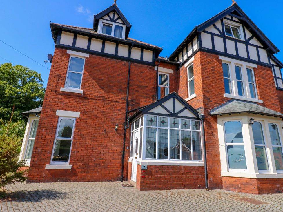 An exterior view of a house with a pathway at Fern Lee in Carlisle