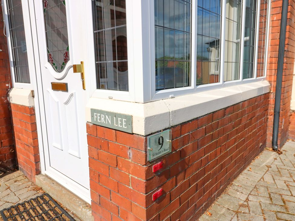 An entrance with a front door and window at Fern Lee in Carlisle