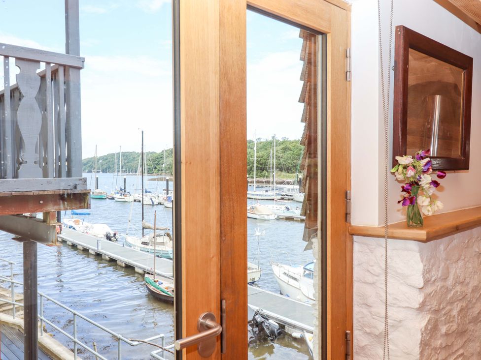 A view of boats from a window at Dolphin Cottage in Brixham