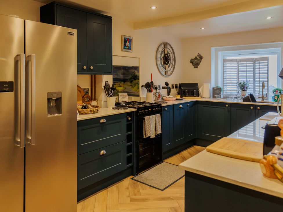 A kitchen with appliances and utensils at Wells Cottage in Holmfirth