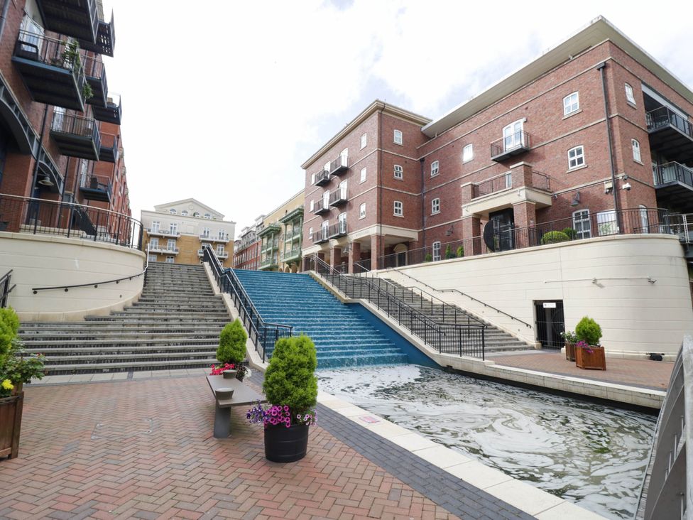 Outdoor area with water features and residential buildings at 63 Vista Heights Solihull