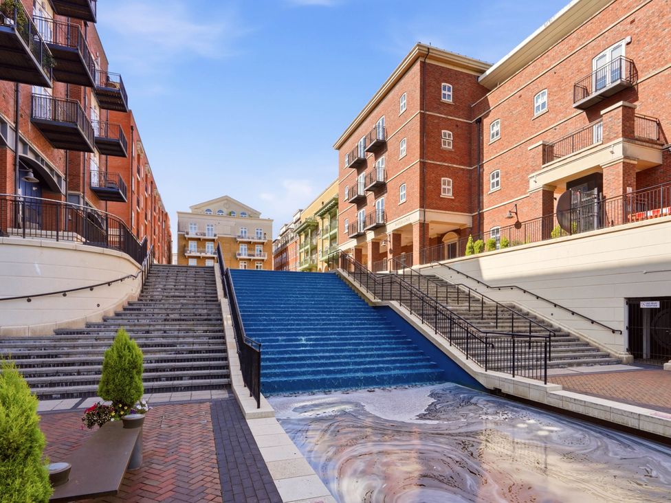 An outdoor scene with buildings and stairs at 63 Vista Heights in Solihull
