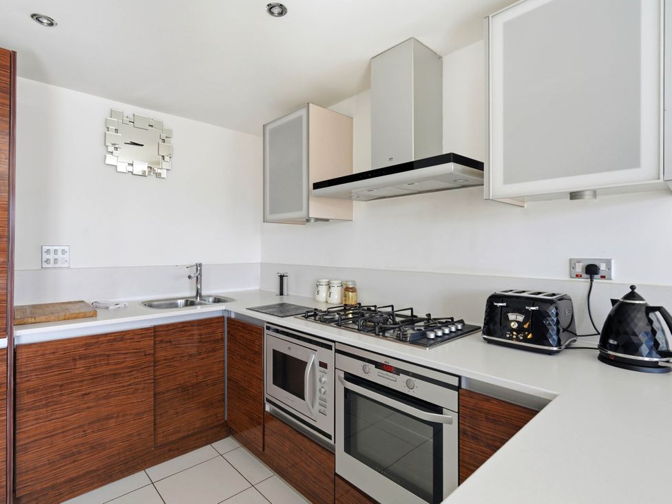 A kitchen with oven and gas stove at 63 Vista Heights in Solihull