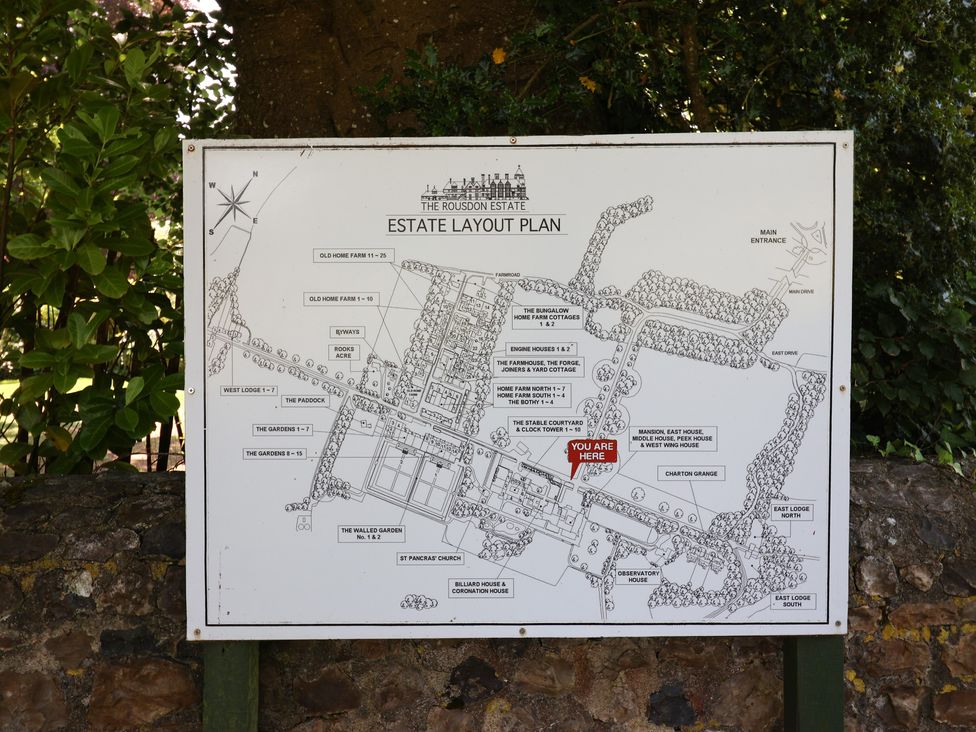 A map of the Rousdon Estate layout showing various buildings and paths at 10 The Gardens Rousdon near Lyme Regis