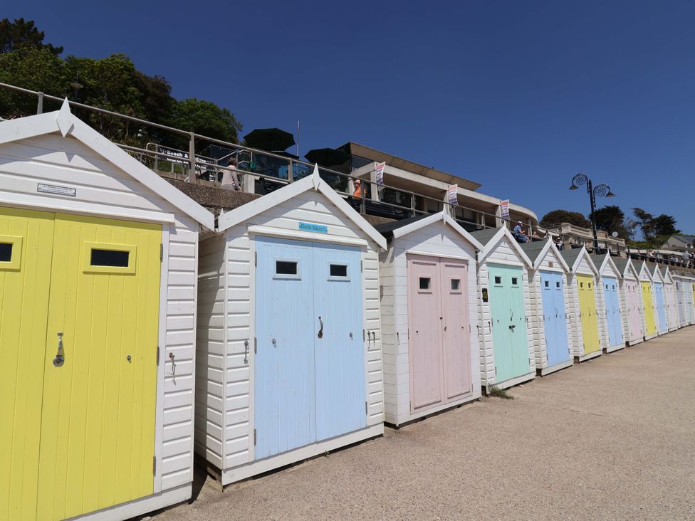 Beach huts in a row at 10 The Gardens Rousdon near Lyme Regis