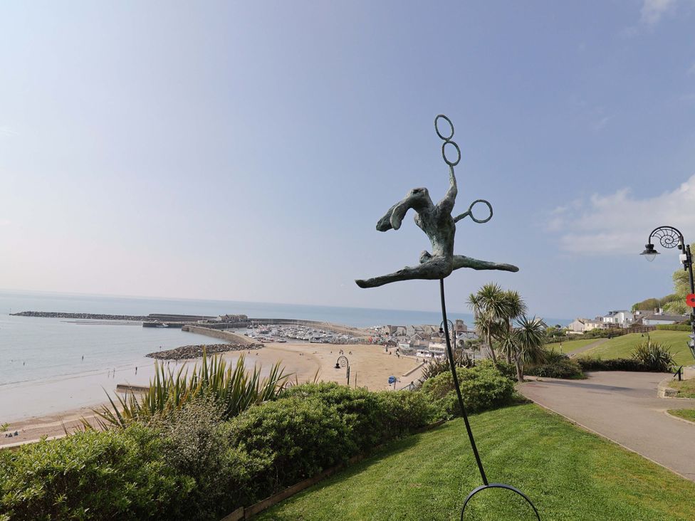 A sculpture overlooking the beach and ocean at 10 The Gardens Rousdon near Lyme Regis