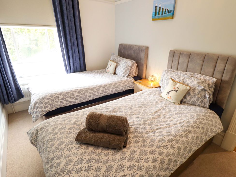 A bedroom with two single beds at 105 Spilsby Road Boston