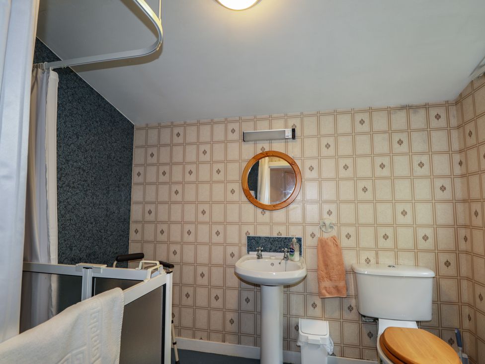 A bathroom with a sink and shower at Ivy House in Kingussie